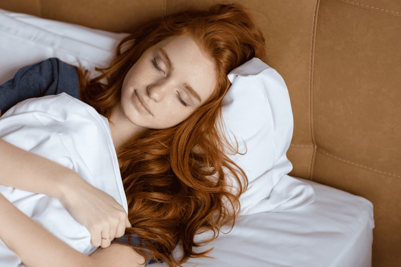 Rest for Recovery, Redhead woman sleeping in the bed - Rest